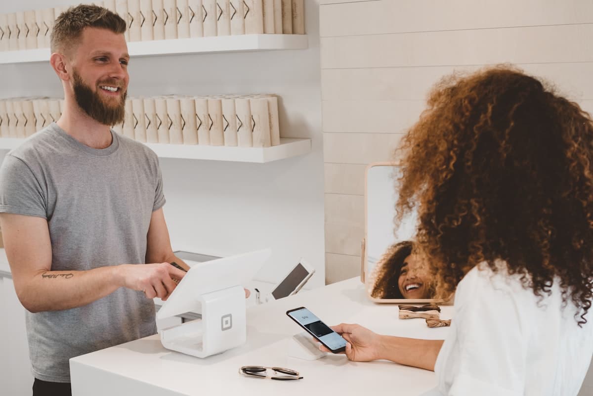 Customer paying at a retail checkout